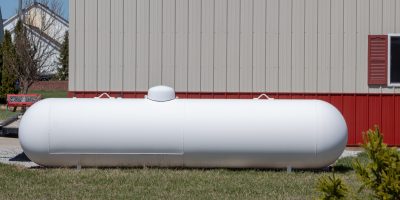 Large propane or liquid gas tank.